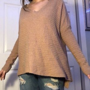 light pink sweater w zipper down the back!